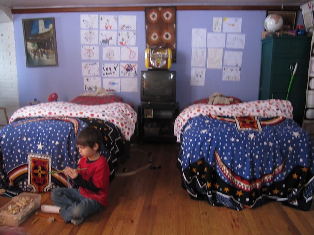 boys' room, beds down, artwork on display