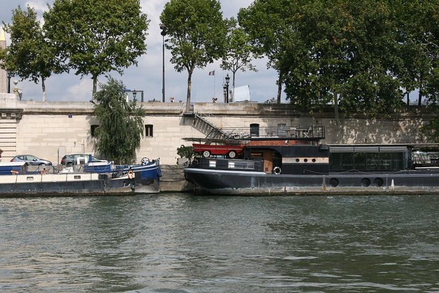 Amphibious car on a barge on the Seine