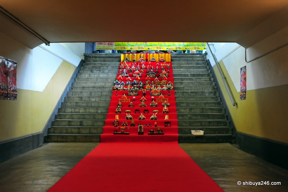 As you approach the display, the red color really starts to get bright. The lighting coming from above creates a warm effect where normally it would be cold concrete.