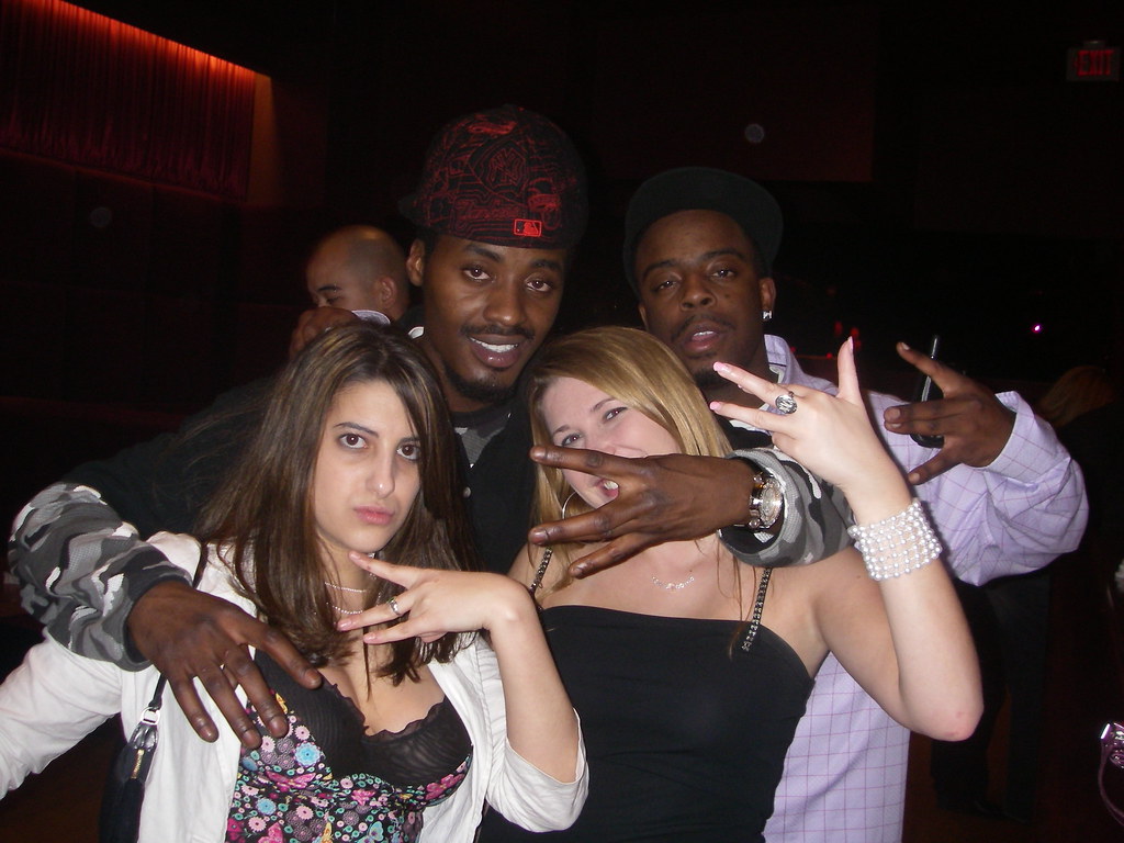 Maggie and Cam throwing up East Coast/West Coast signs with some REAL shady...
