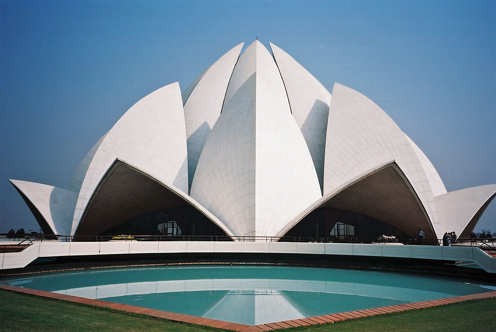New Delhi's Lotus Temple: A large white arched building in three distinct pieces.