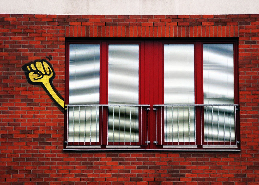 Angry Window | These raised fists are all over East Berlin, … | Flickr