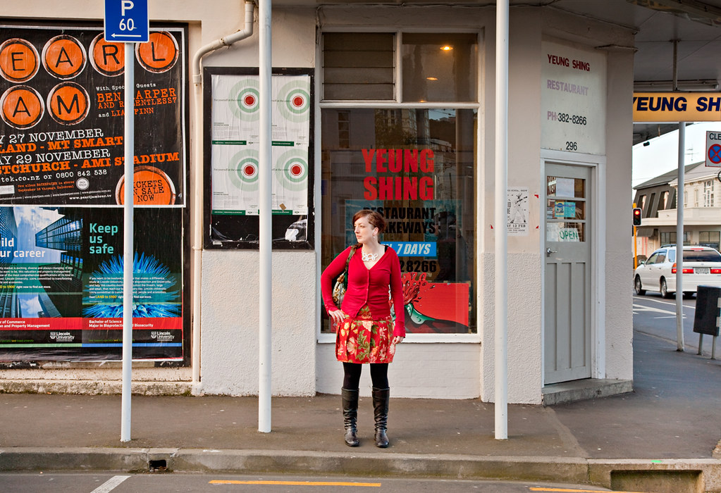 a woman dressed in red on Willis Street by Lester Ralph Blair