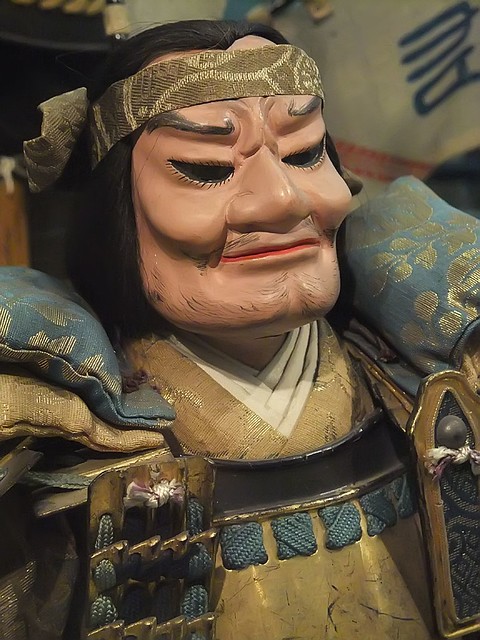 Closeup of General Kasuya Sukezaemon Edo Period 1770 CE Japan painted terracotta heads and hands brocade fabric lacquer and metal armor (1)