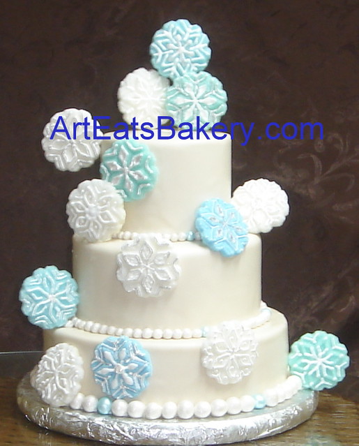 Three tier fondant snowflake wedding cake