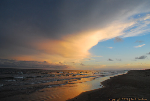 sunset sky orange reflection beach gulfofmexico water clouds evening nikon surf texas portaransas roygbiv d60 mustangisland 6050 nikonflickraward