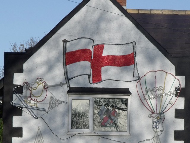 England fan's house with Christmas Decorations in Billesley, Birmingham - England flag on the wall
