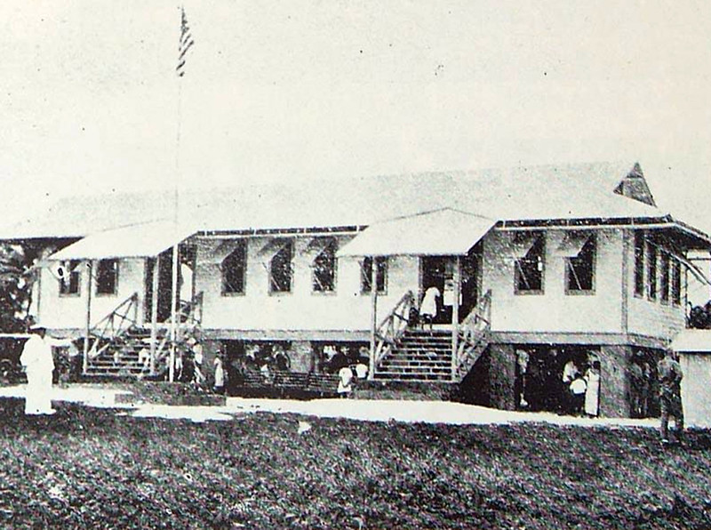 The Jalaguag School of Barrigada is shown here with military officials in the yard during the Naval Era.

Guam Museum
