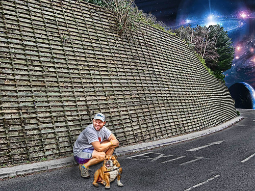 Dog and Man by Wall by Caryson