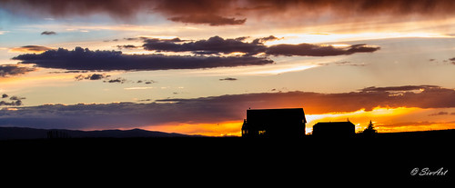 sunset silhouette clouds landscape wyoming