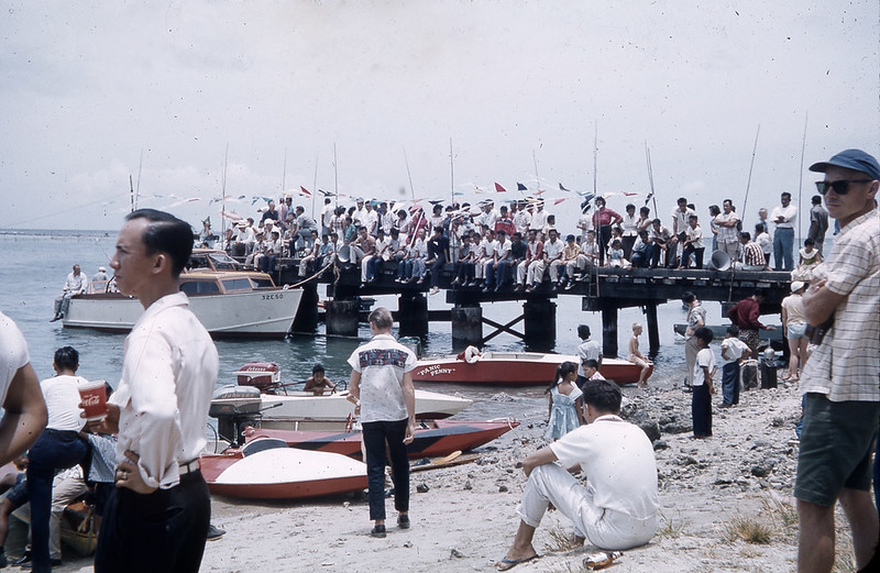 In this historic photo, people crowd the Merizo pier and shore to watch festivities during Malesso' Fiestan Tasi. The festival is still held annually and includes boat races and other water sports, cultural displays and carnival concessions.

Robert Delf/Guam Museum
