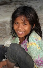 Smiling girl at well; Hon Chong, Mekong River Delta, Vietnam