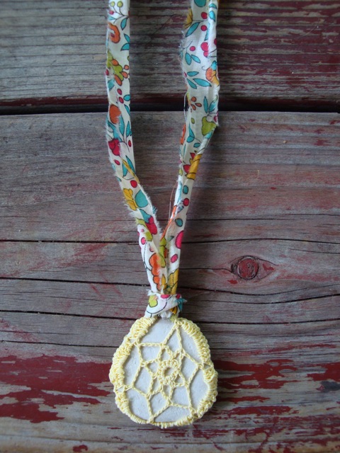 crochet covered stone necklace with liberty fabric