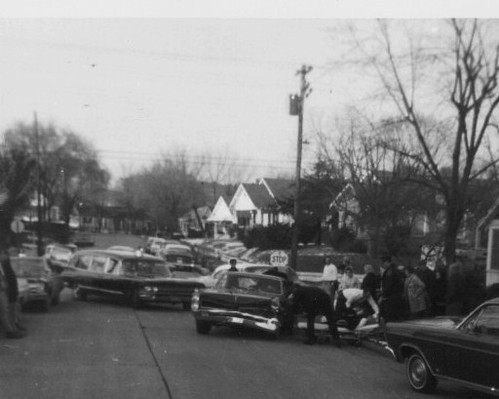 1961 Gross Mortuary black Cadillac combination ambulance at wreck at Oak and Belding streets, Hot Springs, Arkansas, 1966