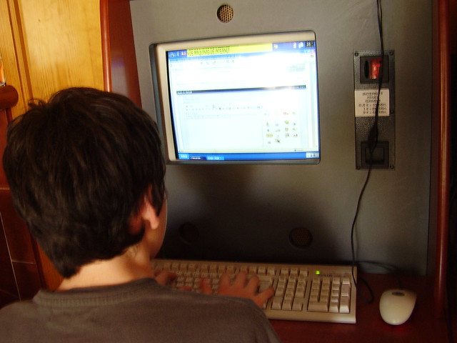 Ben on Computer in George and Dragon 2 - Playa De Muro - July 2009