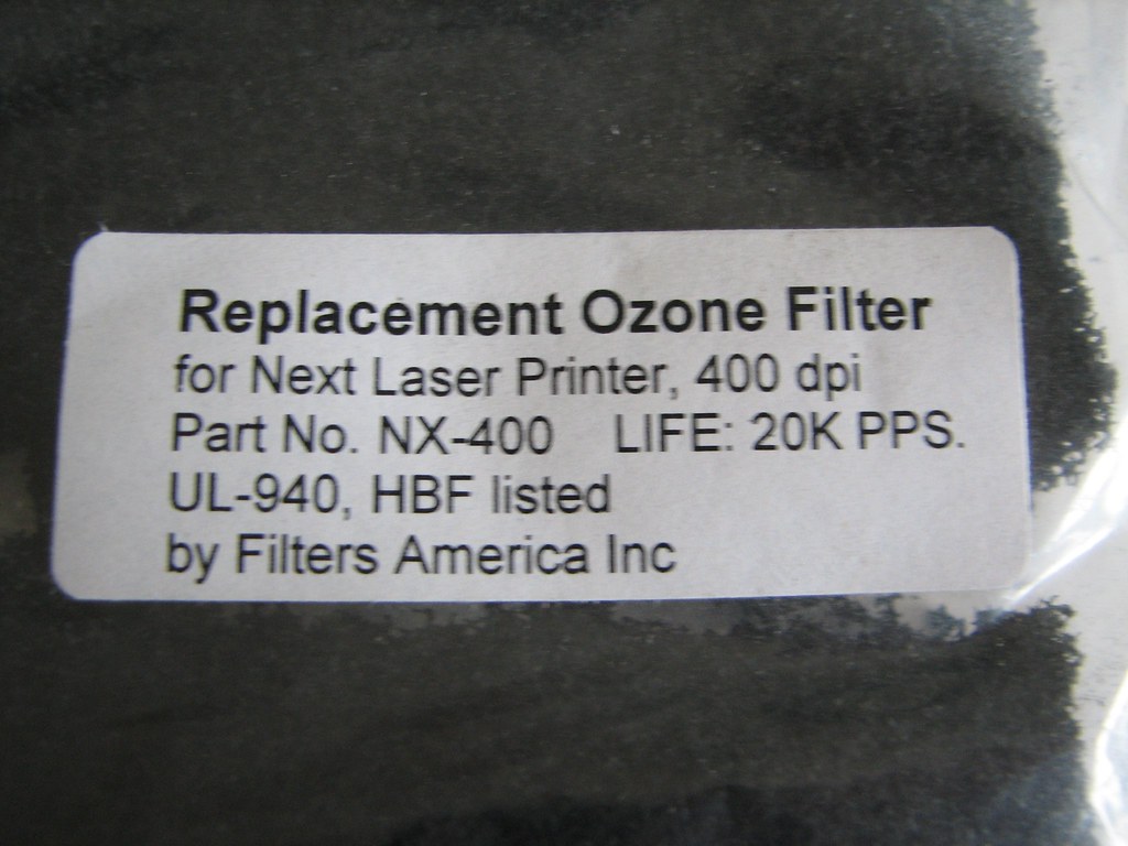 NeXTprinter replacement Ozone filter (degraded) - a picture of a black powder powder powder