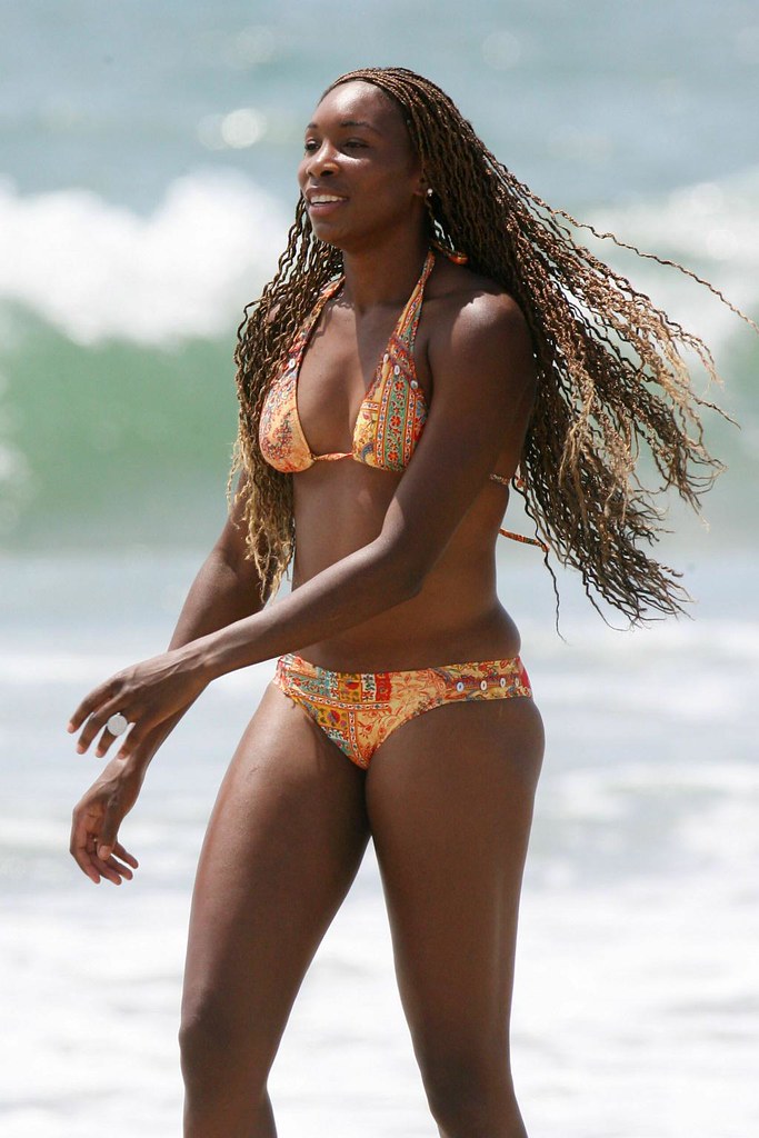 Venus Williams runs on the beach in Malibu.