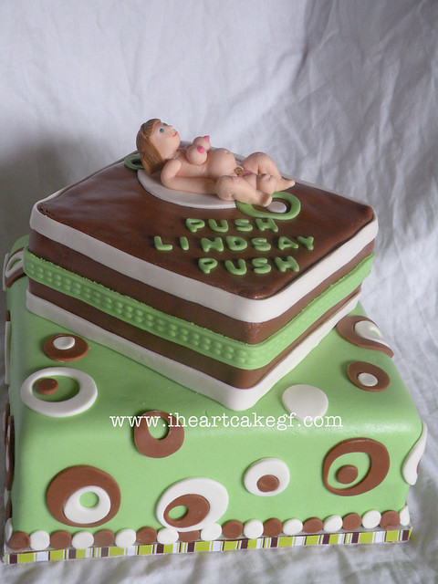 green and brown shower cake with topper