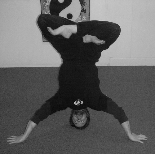 Nate Wolfe performs a difficult yoga posture | Carlisle Kung-Fu | Flickr