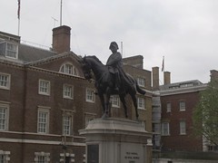 Statue of Field Marshal George Duke of Cambridge and behind that the Former Paymaster Generals Office