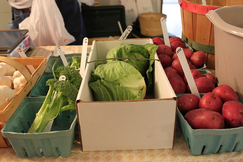 Image of broccoli, lettuce, and potatoes at a Oklahoma City farmers market.