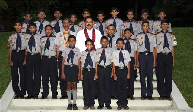 Sri Lanka President Mahinda Rajapaksa  with the Sri Lankan Scout team  who leave the country for  Asia Pacific Regional Jamboree in Philippine this year.