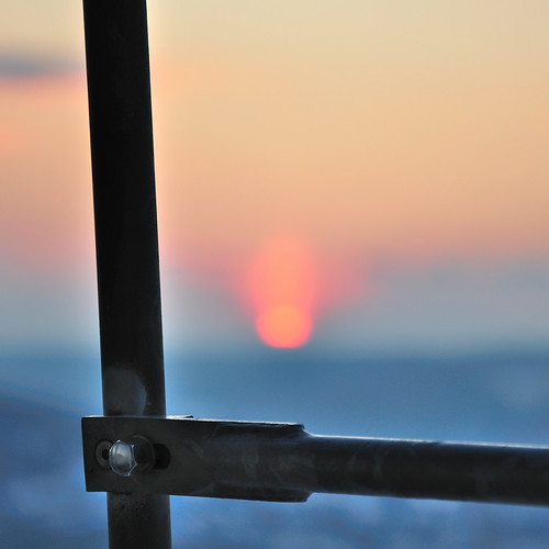 Screw head by Maik.Riegler, This picture shows a screw head of the Energon building in Ulm. The screw head is part of the fire e