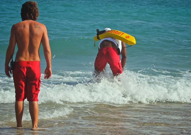 Lifeguards in red cargo pants