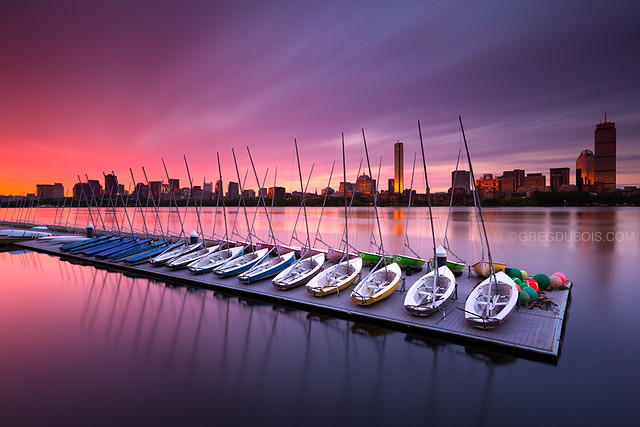 Sunrise over Boston Skyline and Charles River with MIT Sailing Pavilion Boats, Cambridge MA USA
