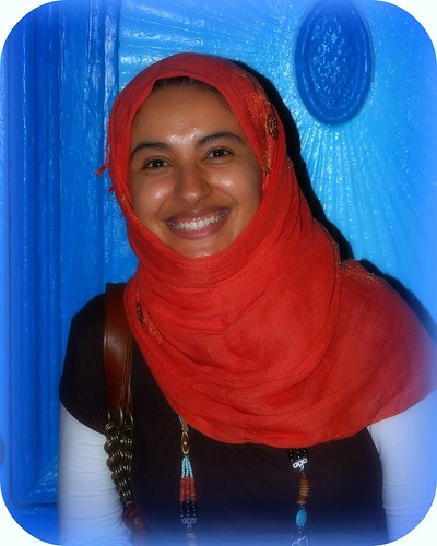africa pink blue portrait woman smile lady d50 geotagged northafrica tunisia muslim sidibousaid hijab bluedoor arabworld views100 5photosaday geo:lat=36871023 geo:lon=10348861