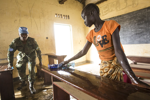 Rwandan Battalion Helps Local Community Clean School
