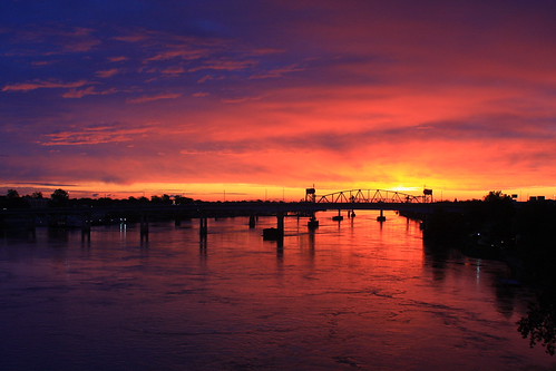 River of Color by davidphoto23, This Photo was taken on the Broadway st Bridge in Little Rock Arkansas. Race for the Cure morning. c