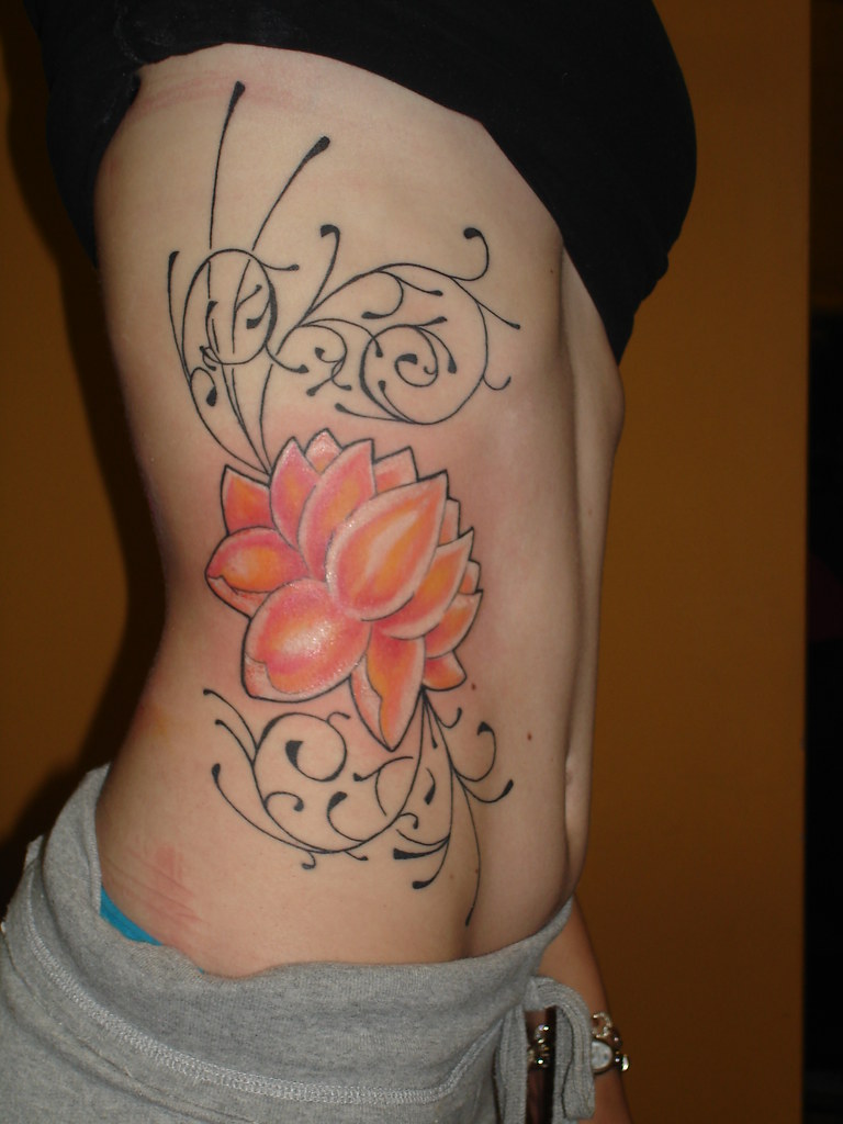 tattoos by gavin | a free hand lotus and swirl tattoo on rig… | Flickr