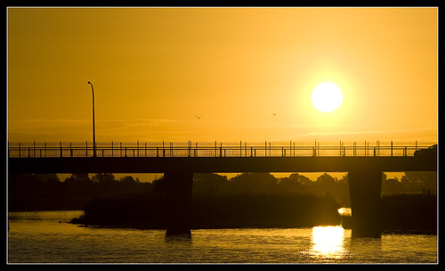 bridge sunset sky people orange sun color lamp river post bright whakatane