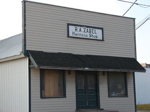 Need a harness? This old storefront sign in Eldridge, IA s… Flickr