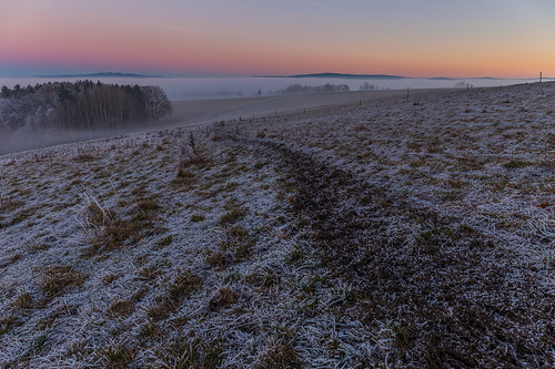 Frozen fields and woods overlooking Ore Mountains by tvrdypavel, Frozen fields and woods overlooking Ore Mountains during sunsetlandscape attraction background beaut