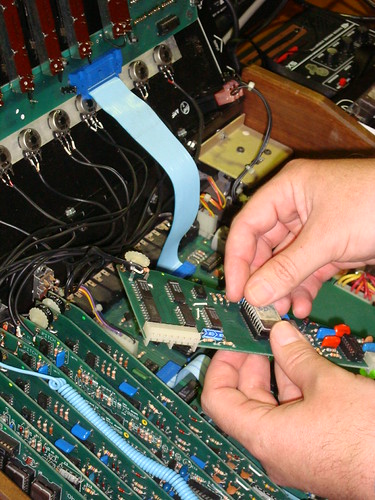 Swapping out the chip on a DMX drum machine to change the samples. Customised genius | by petermclennan