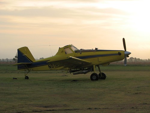 sunset sky yellow plane sunrise canon airplane flying wings louisiana aviation farming spray powershot crop ag duster agriculture propeller turbine prop turboprop spraying cropduster 502 propjet airtractor at502