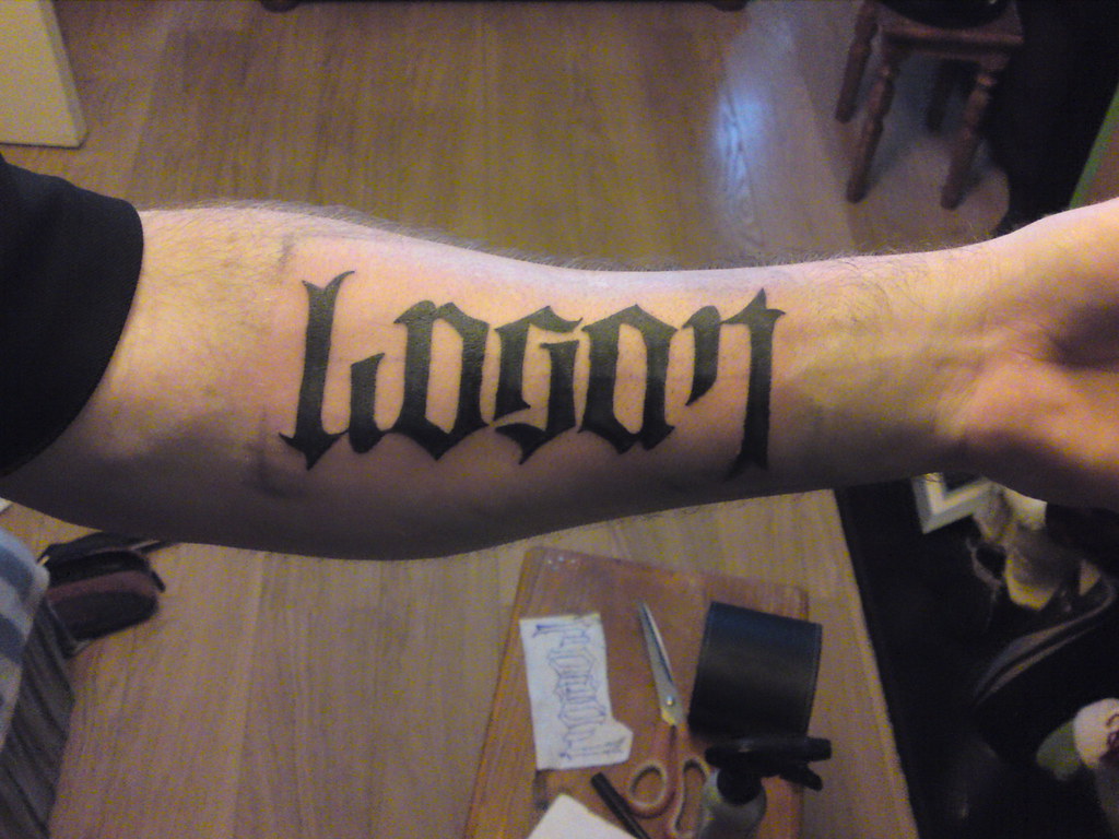 Family and One Love Ambigram Tattoo