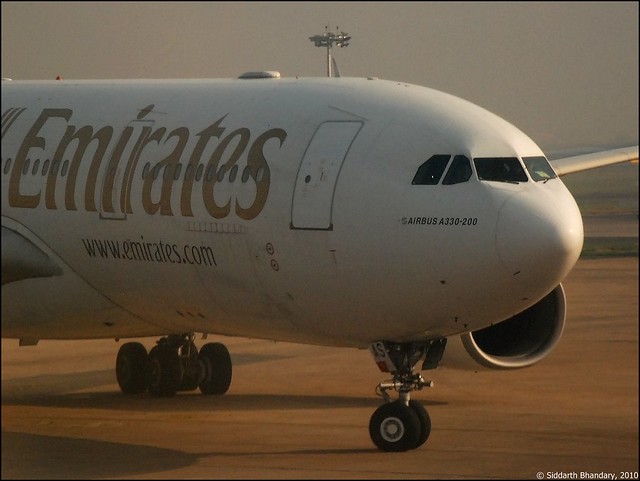 Emirates A330 taxing to gate