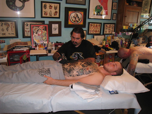 Alex Tattooing at Rock of Ages