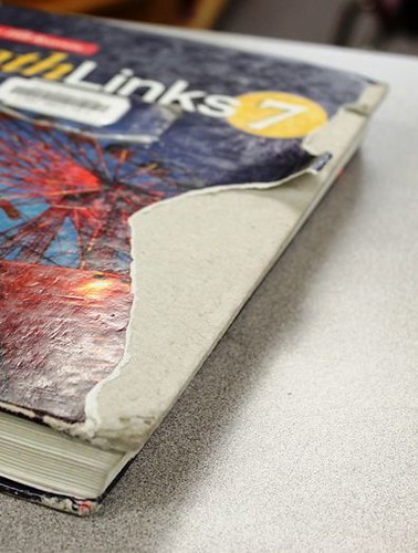 Damaged Textbook - Cover Tear