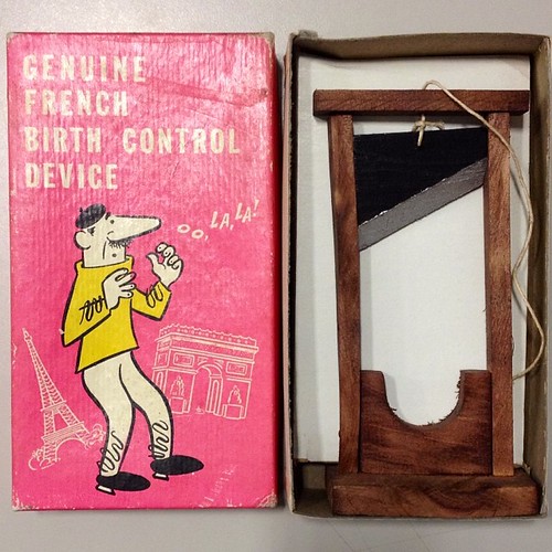 Some interesting finds at work today. #SpringCleaning. Copyright date says 1969. #OoooLaLa. #BirthControl #Guillotine #French | by Andrew P. Forbes