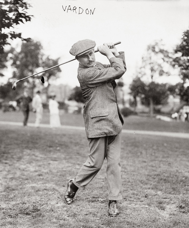 Mr. Vardon swinging golf club.