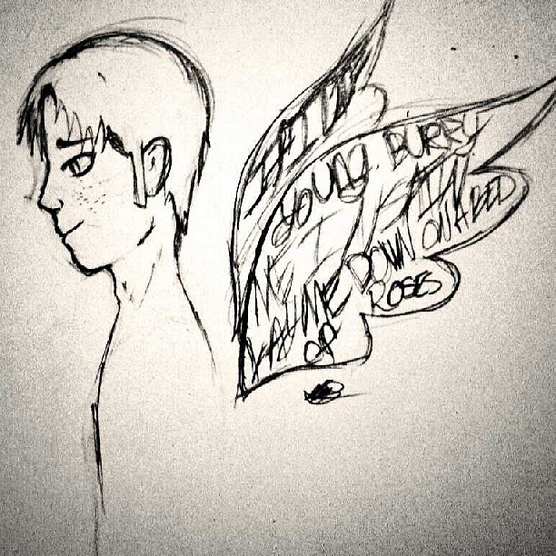 i drew a marco because i was sad. the wings have the lyric…