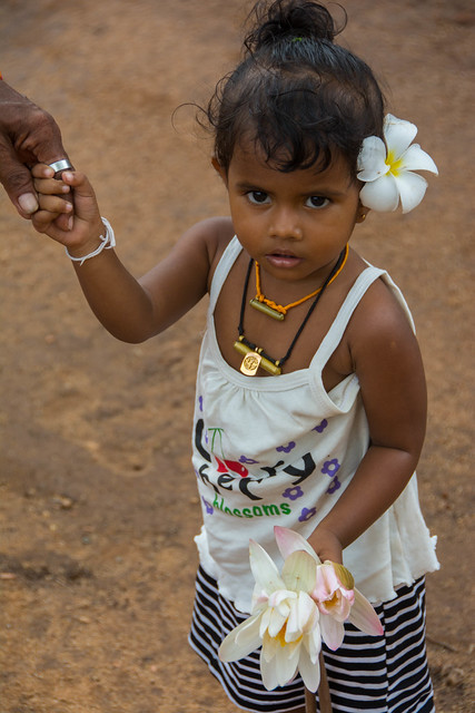 Girl with Lotus Flowers, Mihintale, Sri Lanka