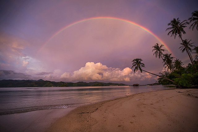 Gigantic rainbow on Cubadak island in West Sumatra, Indonesia.