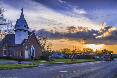 Methodist Church - Columbia, Alabama by A. Michael Uhlmann, landscape church alabama unitedmethodist sunset truck nopeople orange yellow blue