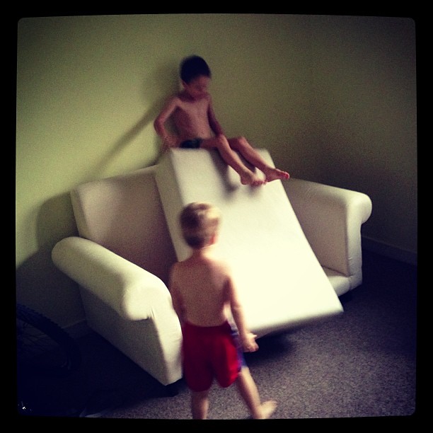 When you have no #toys, you #invent your own. #brothers #couchslide #waitingforourshipment