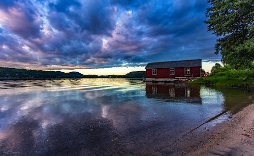 boathouse calm mirror reflection sailboat tranquillity quiet weather austagder clouds fjord still beach maritime risør vivid sunset sea silence sky norway cove shore harbour water no